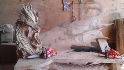 Creative Chainsaw Artist Carves Mesmerising Dragon Bench Out Of Wood