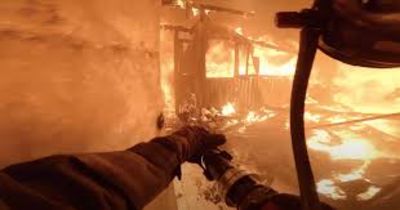 The POV Of a Firefighter Fighting a House Fire