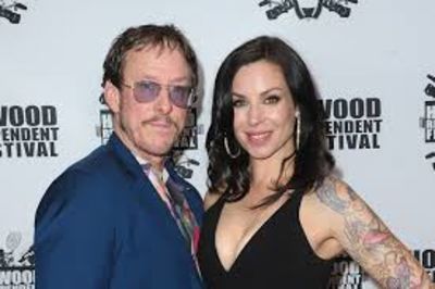Wife Of Weezer bassist Scott Shriner Arrested For Attempted Murder And Shot By Police