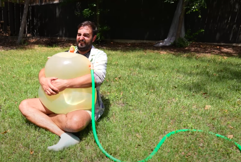 Blowing Up Stretching Armstrong Doll With Hose 1