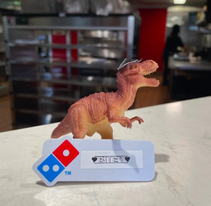 Dominos Staff Appoints Dinosaur Toy Employee For a Night 1