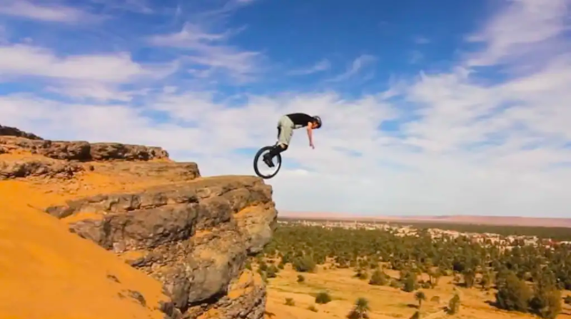 Athlete Rides His Unicycle Like Mountain Bike 1