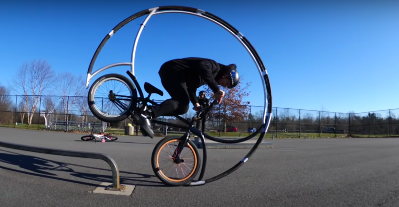 BMX Riders Roll Down Cement Ramps On Roller Coaster Bicycle Design 1