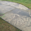Woman Transforms Driveway Into Stunning Art With Only a Power Washer
