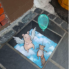 Michigan Artist Turns Sidewalk Defects Into Adorable Chalk Art Characters