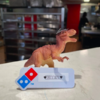 Dominos Staff Appoints Dinosaur Toy Employee For a Night