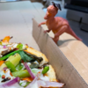 Dominos Staff Appoints Dinosaur Toy Employee For a Night